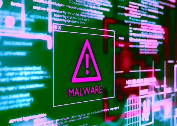 A Computer Screen With Program Code Warning Of A Detected Malwar